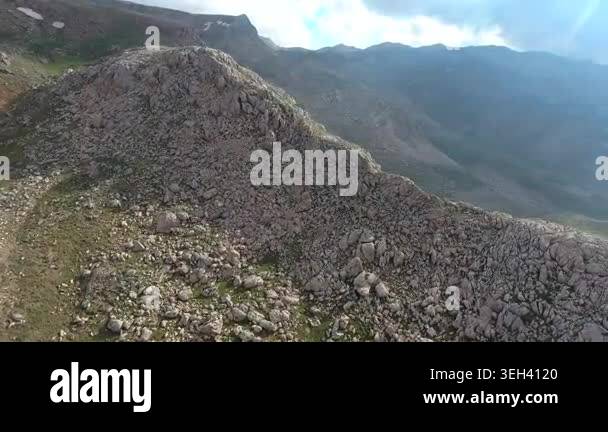 Rocky mountains span in Turkey, revealing barren ridges, sparse trees ...