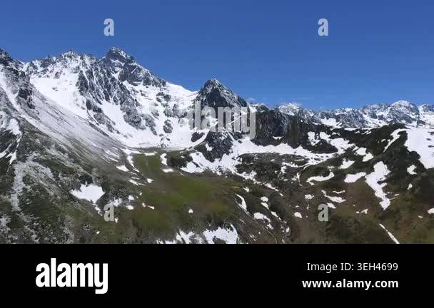 Aerial glacial valleys on Qinghai Plateau lie below snowy Himalayan ...