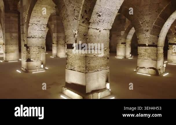 Stone arches and columns line Sultanhani Caravanserai interior in ...