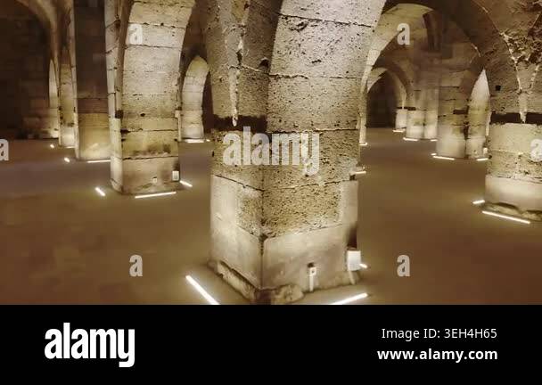Stone arches and columns line Sultanhani Caravanserai interior in ...
