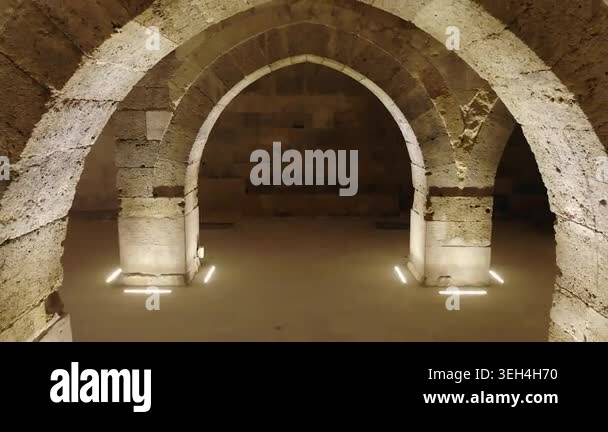 Stone arches and columns line Sultanhani Caravanserai interior in ...