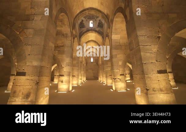 Stone arches and columns line Sultanhani Caravanserai interior in ...