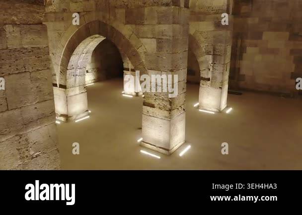 Stone arches and columns line Sultanhani Caravanserai interior in ...