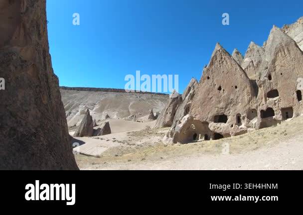 Fairy chimneys and cave houses rise from Cappadocia valleys under ...