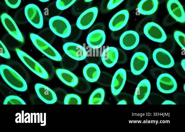 Microscopic view of glowing green ovals Stock Video Footage - Alamy
