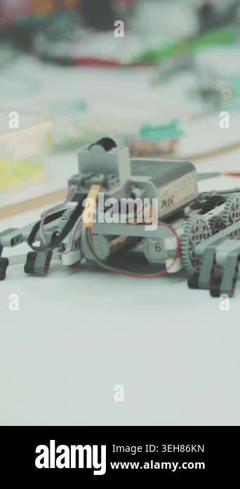 miniature robot rover on marked track, closeup view of wheeled ...