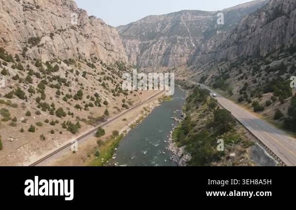 Cinematic 1080p drone ascent and forward flight through Wind River ...