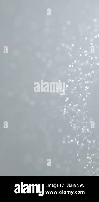 White soft snow particle stream gently drifting glowing bokeh dots ...