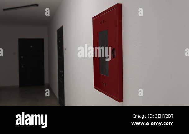 Red fire cabinet on wall, corridor view with dark doors, polished ...