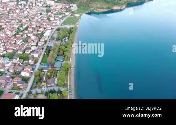Aerial view on Ohrid Lake and buildings near water in Macedonia. Drone ...