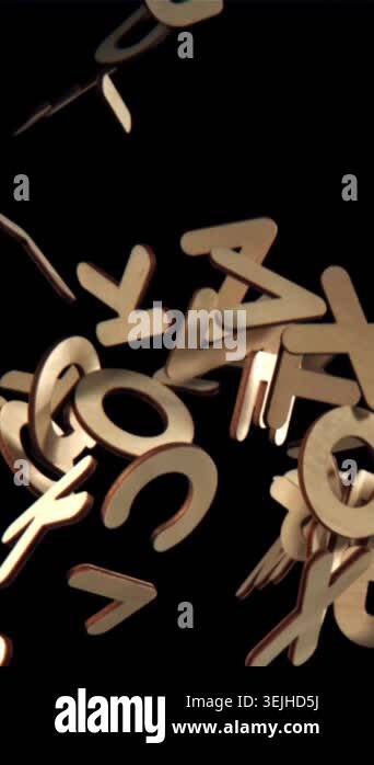 The fall of wooden English letters. Filmed on a high-speed camera at ...