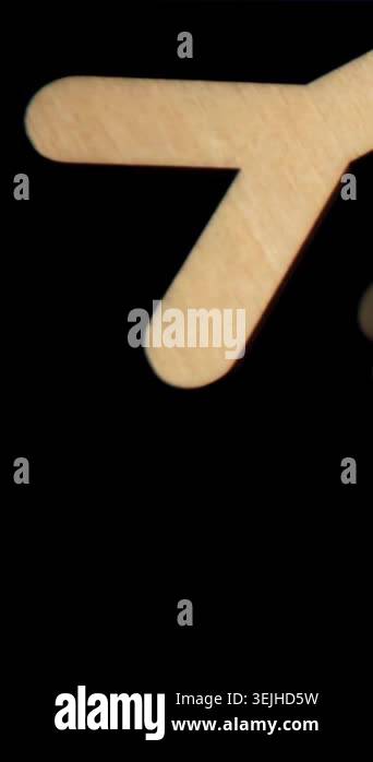 The fall of wooden English letters. Filmed on a high-speed camera at ...