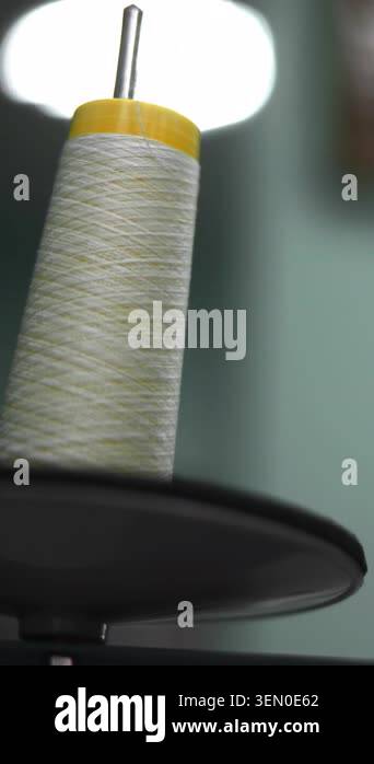 Closeup Spools Of White Thread On Industrial Sewing Machine, Blurred ...