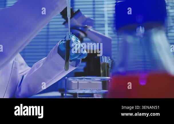 close up of scientist with test tube in the laboratory Stock Video ...
