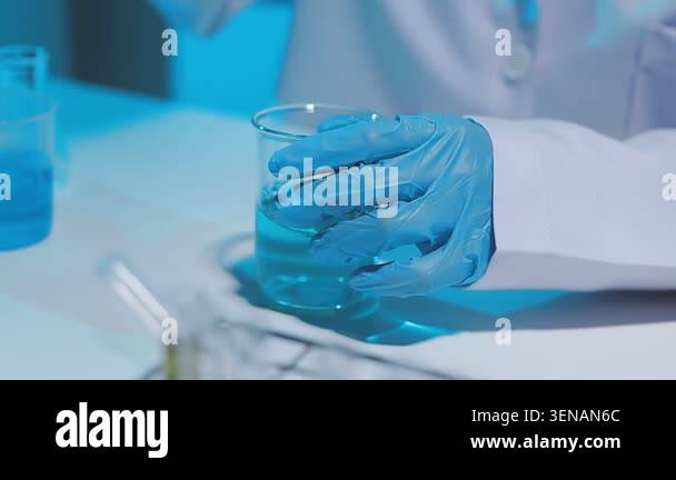 scientist holding test tube in laboratory Stock Video Footage - Alamy