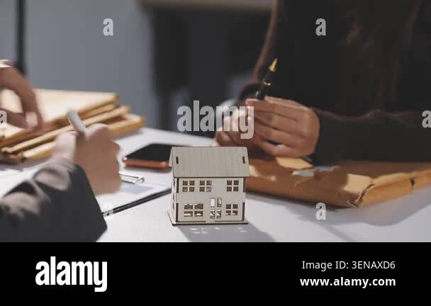 woman holding model of house with keys Stock Video Footage - Alamy
