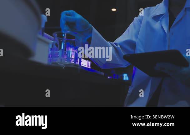 scientist holding a tube with test tube in a laboratory Stock Video ...