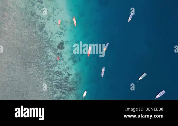 aerial-view-on-ocean-boats-floating-on-blue-water-at-sea-landscape-of