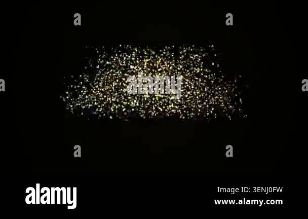 Golden sparkling particles form Happy Birthday text on black background ...