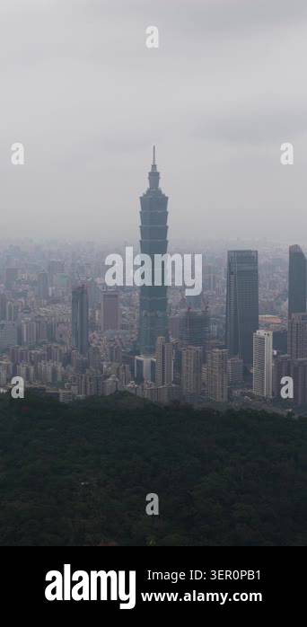 Iconic taipei 101 tower rising above the bustling city skyline on a ...