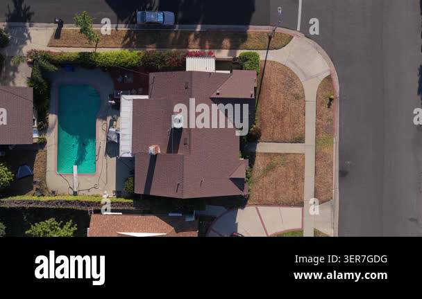 Suburban home in Los Angeles showcasing private swimming pool ...