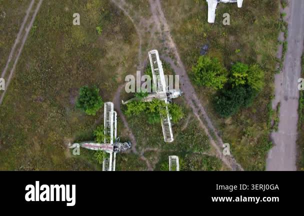 Top down aerial scene with vintage Antonov An-2 biplanes and Aero L-29 ...