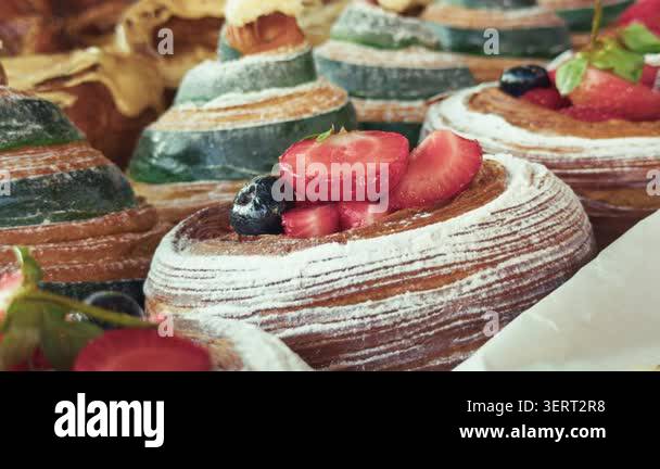 high-quality-cinematic-close-up-of-fruit-topped-pastries-with
