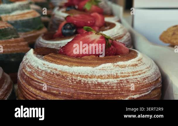 high-quality-cinematic-close-up-of-fruit-topped-pastries-with