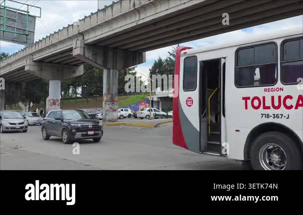 Toluca, Mexico, MAY 24, 2026, Time lapse of urban traffic and commuters ...