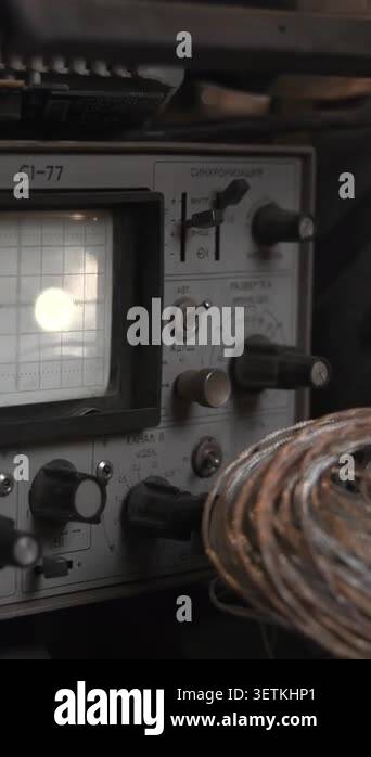 Signal Oscilloscope And Coiled Wire On Testing Bench, Glowing Trace And ...