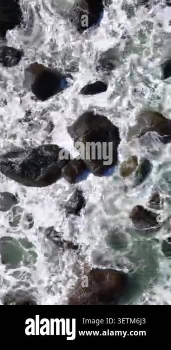 Tropical beach with waves hitting on the rocks at Brazil Stock Video ...