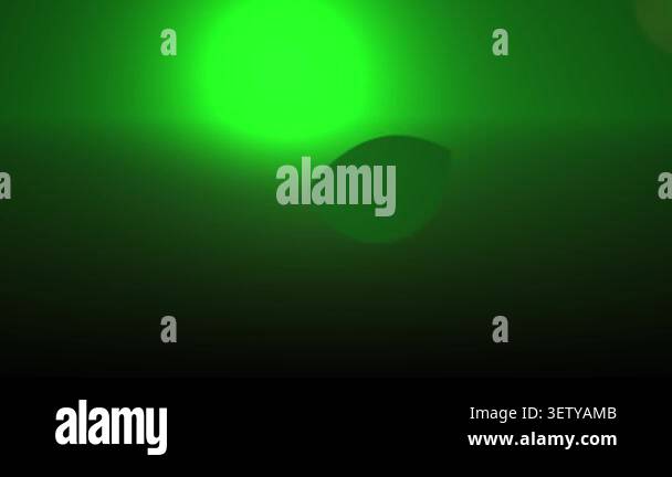 Green neon light glowing in the dark with a circular shape Stock Video ...