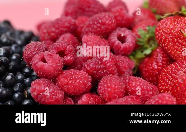 A video featuring a mix of currants, raspberries, blueberries, cherries ...