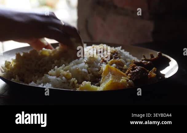 Hand Eating Rice and Meat Curry on Plate Stock Video Footage - Alamy