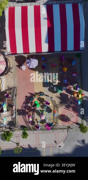 Geometric pattern with shadows, vibrant colors and fun park setting ...