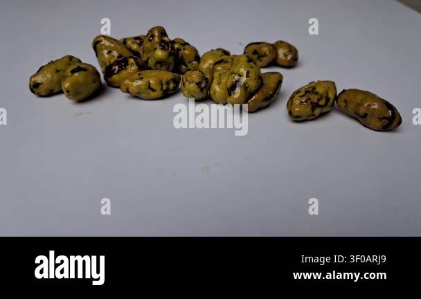 A closer macro view of freshly harvested turmeric spice rimpang pieces ...
