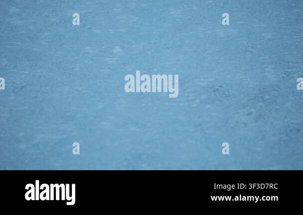Blue pool surface dominates frame, ripples dance under bright sun ...