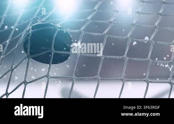 Super Slow Motion Hockey Goal at Professional Ice Arena. Puck Hitting ...