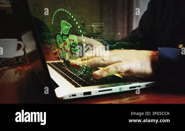 Eco mode and ecology friendly symbol and man typing computer keyboard ...