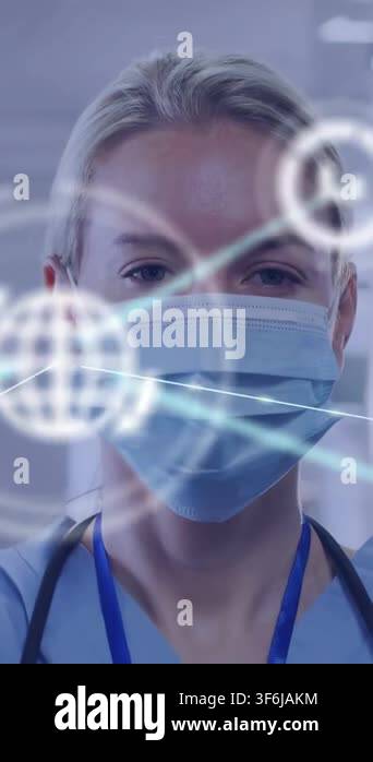 Vertical video: Dr standing in ward, tracking AR overlays moving ...