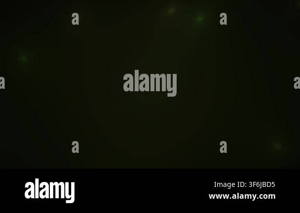 A dark background with green light spots Stock Video Footage - Alamy