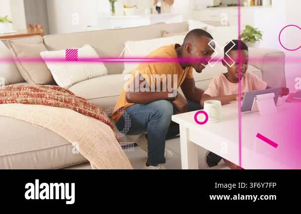 Dad pointing at tablet, teaching son tapping while magenta overlays ...