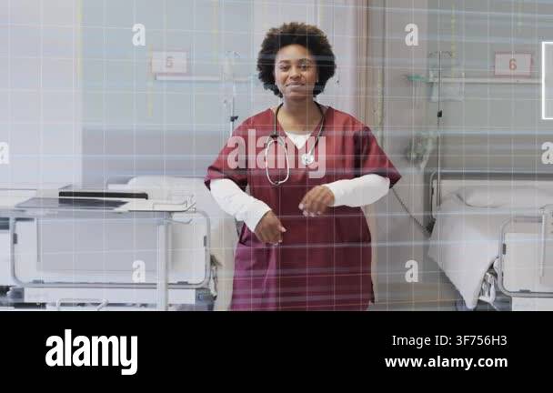 Nurse sliding out pockets, adjusting sleeves crossing arms, smiling ...