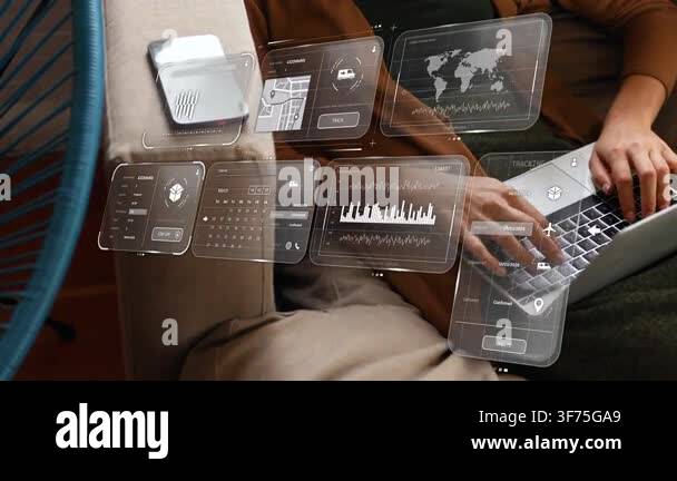Woman typing on laptop on couch, UI panels appearing, settling over ...