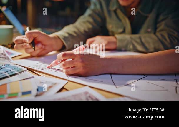 Closeup designer hands sketching app wireframe paper markers, design ...