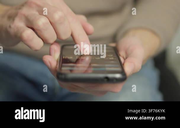 Person navigates smartphone interface, highlighting tactile experience ...