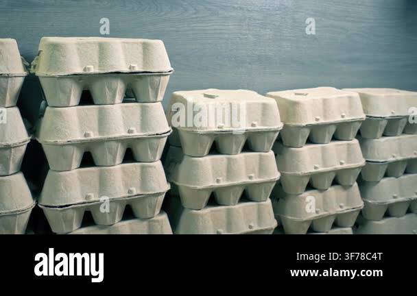 Egg Box Added To Stack Retail Scene Stock Video Footage - Alamy