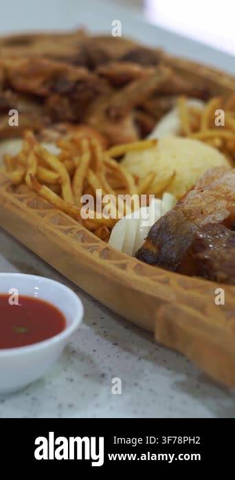 Slow motion camera panning of traditional Central Asian mixed platter ...