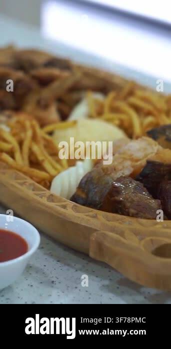 Slow motion camera panning of traditional Central Asian mixed platter ...