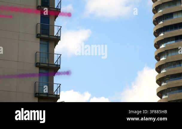Magenta-blue smoke trails from right sweeping gap, veiling and ...